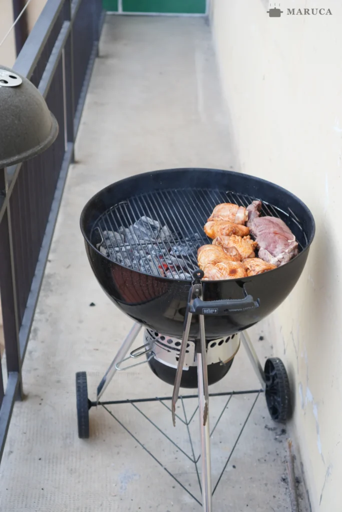 preparando la parrilla para el asado
